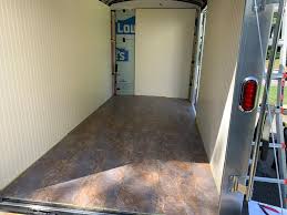 It's easier to cut vinyl flooring to the exact shape and size of your room when you make a template first. How To Install Vinyl Plank Flooring In Your Cargo Trailer Camper Cargo Trailer Camping