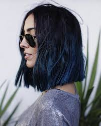 Lean into the whimsy of a blue ombré look by styling it in something equally playful—like space buns. 15 Daring Blue Black Hair Ideas Styleoholic