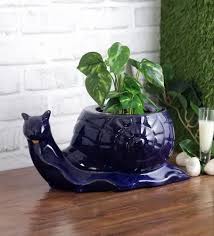 glazed ceramic snail shaped planter