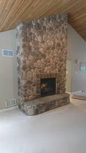 Stone Veneer Over A Brick Fireplace