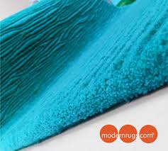 solid turquoise s wool rug from the