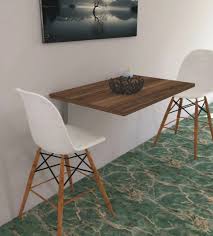 Duvara sabitlenen katlanır masa küçük mutfaklar ve diğer odalar için çok kompakt ve ergonomik bir modeldir. Kucuk Mutfaklara Mutfak Masasi Modelleri 12 Cok Satan Mutfak Masasi