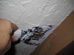 hand plaster walls to cover wallpaper