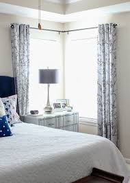 how to hang curtains in a corner window