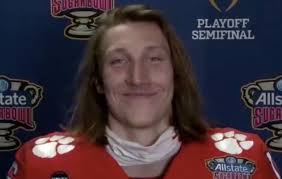 It doesn't appear that it's photoshopped. Trevor Lawrence Presser Awkwardly Includes Mustache Commentary From Unmuted Reporter