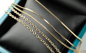how to spot fake gold chains silver