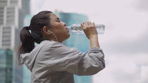woman drinking water stock video