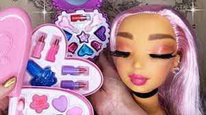 asmr applying kids makeup on doll head