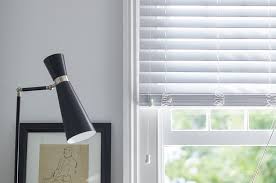 what is faux wood vs real wood blinds