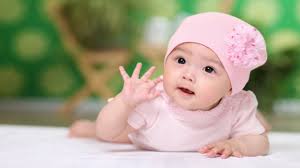 cute baby child in light pink