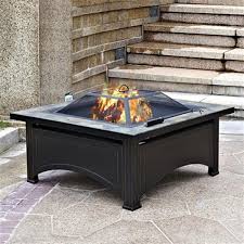 Both are great for find all the great fire pits and outdoor fireplaces and accessories when you shop online at walmart canada. Az Patio Heater Wood Burning Fire Pit With Slate Table Black Lowe S Canada