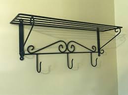 Wrought Iron Wall Shelf Unit With Coat