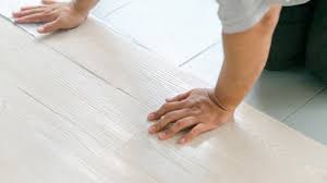 can you lay vinyl over tiles we have