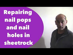 repairing nail pops and nail holes in