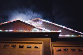 how to hang christmas lights on gutters