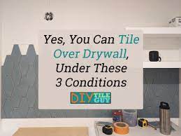 yes you can tile over drywall under