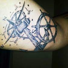An anchor compass carries a religious meaning because the anchor is a common symbol of. 70 Ship Wheel Tattoo Designs For Men A Meaningful Voyage