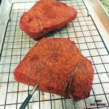 grilled sirloin steaks on a traeger