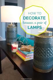 How To Decorate Between A Pair Of Lamps