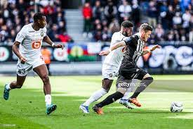 Pierrick CAPELLE of Angers and Jonathan BAMBA, Tiago DJALO of Lille... News  Photo - Getty Images