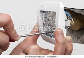 After stripping the incoming cable, connect the neutral and ground wires to their corresponding bus bars. Change Light Switch Connect The Wires From House Wiring Wiring Connecting To The Home Electrical Light Switch Close Up Canstock