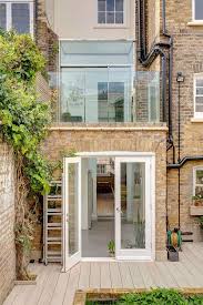London Terrace House Gets Smart Extension With Walk On Skylights