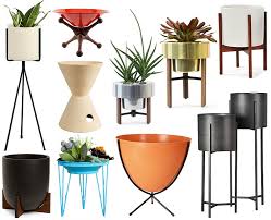 You can conveniently grab an economical wood one and also just paint it whatever color matches your bathroom. Mid Century Indoor Planters Honestly Wtf