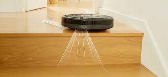 can robot vacuums go over rugs ai