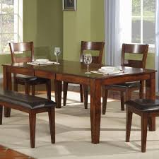 Metal table bases versus wooden table bases metal table bases tend to be sold in greater dining table upholstered parson chairs or benches, with metal legs. Warehouse M 1279 4939454 Modern Solid Mango Wood Dining Table Pilgrim Furniture City Dining Tables