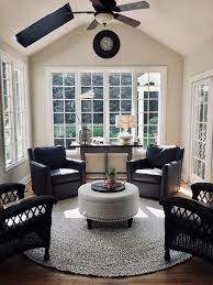 Sunroom With Round Rug Swivel Chairs