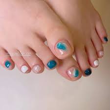 teal shimmery and white toe nails