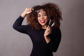 afro woman professional makeup artist