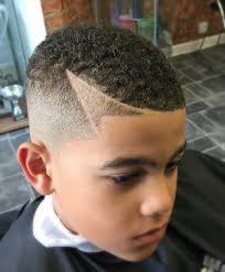* low faded haircut with shaved side. 35 Popular Haircuts For Black Boys 2021 Trends