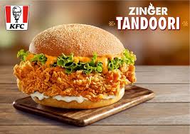 Kfc zinger burger or chicken burger is the perfect fried chicken sandwich with an added zing! for lovers of a little extra heat. Festivities Get A Zing With Kfc S New Tandoori Zinger Burger Now Enjoy Your Favourite Zinger Burger With A New Tandoori Twist Global Prime News