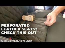 to clean perforated leather seats
