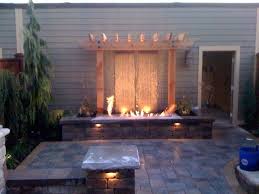 Water Feature With Fire Pits Backyard