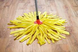 how often to mop wood floors safely and