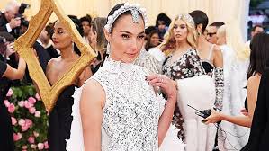 The former miss israel transitioned into acting beautifully, recently earning the coveted role of wonder woman — one of the upcoming films set to break the curse of dc movies. Gal Gadot S Dress At Met Gala 2019 Wows In Sheer Dress Boots Hollywood Life