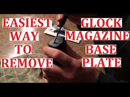 remove glock magazine base plate