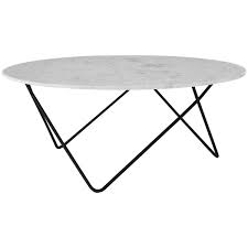 The rectangular legs easily reveal carpet designs, yet create an industrial or modern feel to nearly any room. Modern Home Rolo Round Coffee Table White Marble Black Metal Legs Free Next Day Delivery