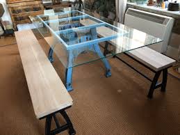 Functionality of glass top dining tables the primary function of any dining table, including these, is for sitting down and enjoying a meal. Industrial Based Dining Tables From Recycled Steel And Iron With Oak Tops