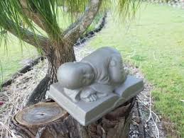 Concrete Statues In Queensland Garden