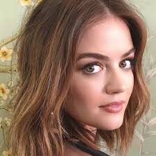 lucy hale is wearing wire in her hair