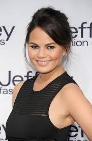 Then wrap your hair around the ponytail. Hilarious Model Chrissy Teigen Is Just Like You Except For That Marrying John Legend Thing Find Out How She Keeps Her Skin Soft What Her Favorite Concealer Is And Why She S Jealous