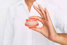 what causes denture pain and how to