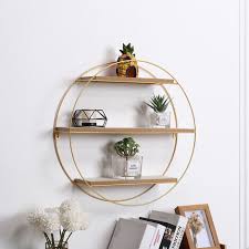 floating gold metal round wall shelf