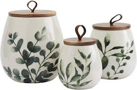 Napcoware canister set of 3 white blue flour coffee tea kitchen storage unique. Amazon Com Tabletops Gallery Ceramic Canister Collection Stoneware Designed Embossed Acacia Wood White Set 3 Piece Green Leaf Canister Set Kitchen Dining