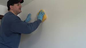 how to remove old wallpaper glue with