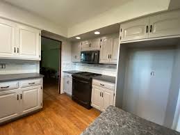 kitchen cabinet refinishing cost vs a