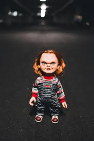chucky doll in red and black striped
